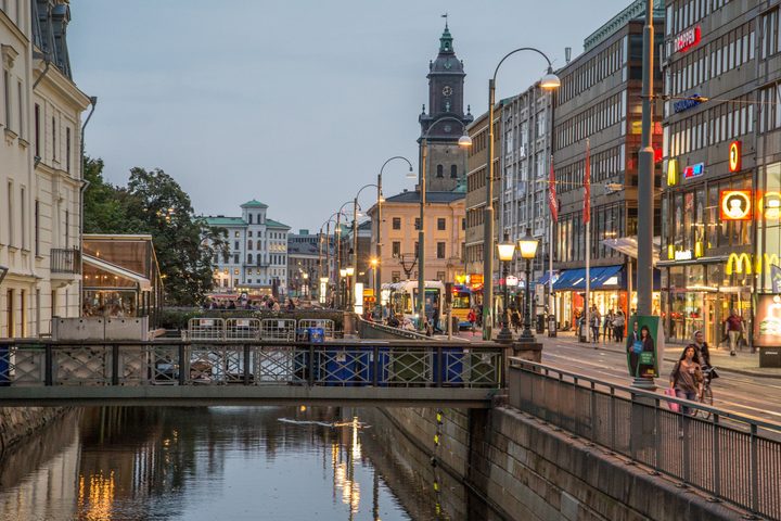 Gothenburg canal, pedestrian bridge and illuminated city street photographed in September 2014