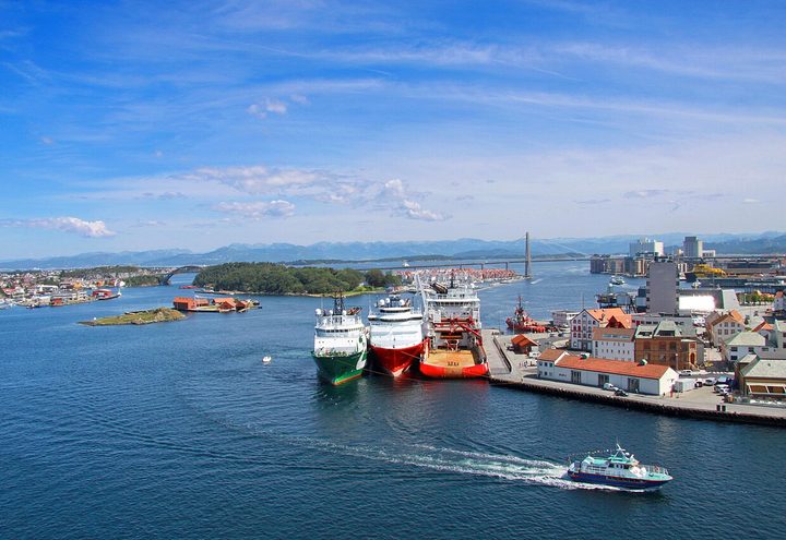 Boats and colourful waterfront buildings around the harbour in Stavanger, Norway